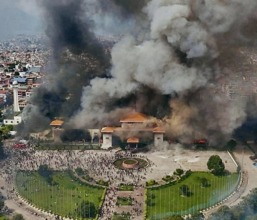 Protesters set Nepal parliament on fire