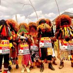 Masquerades display Soludo’s campaign posters ahead of Anambra guber