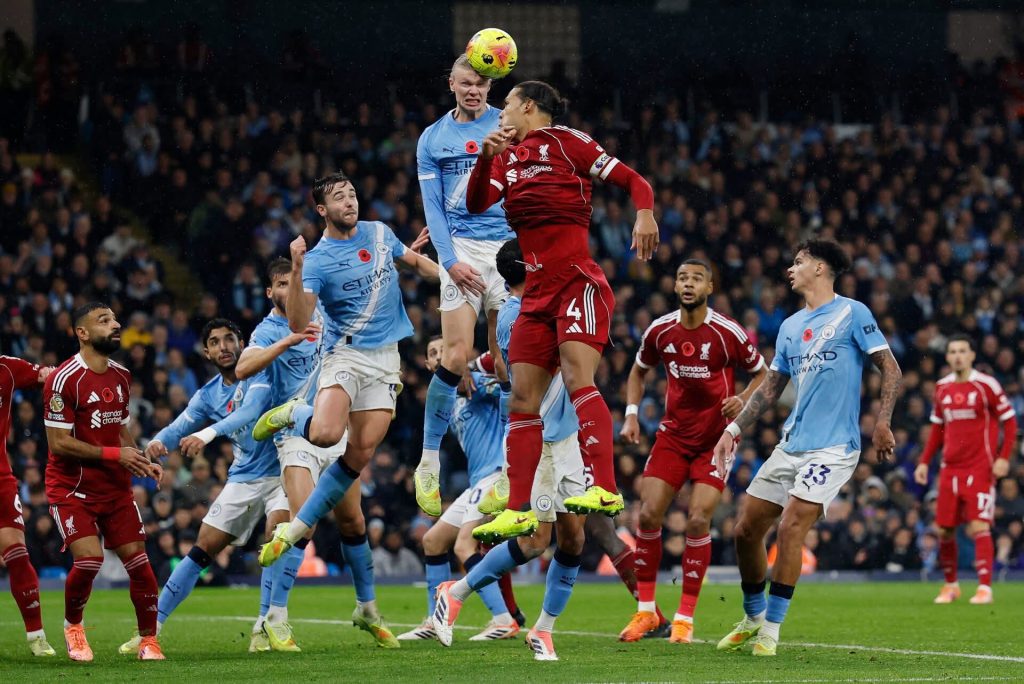 Man City ease past Liverpool to go second